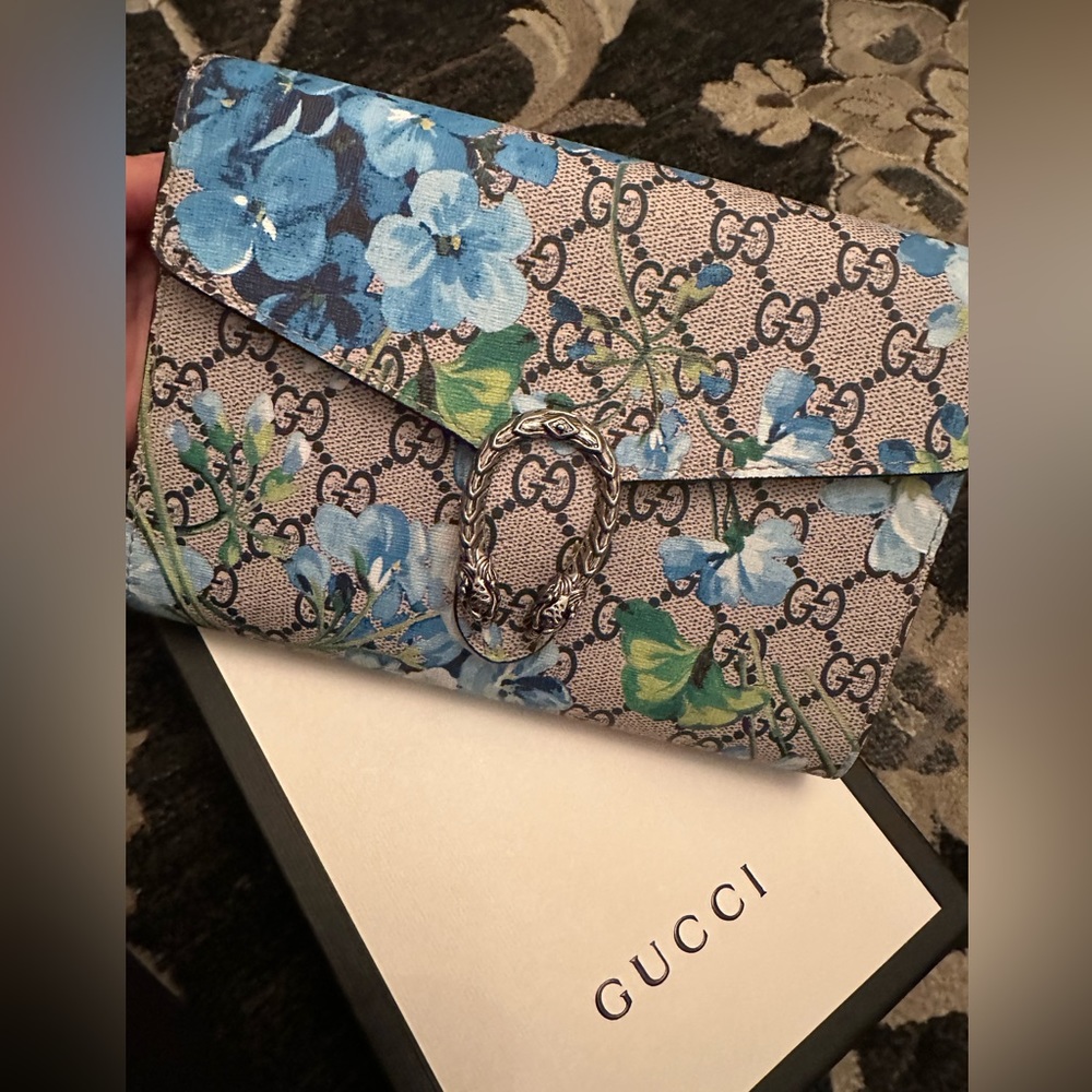 Authentic
Gucci  beige with blue flowers leather bag